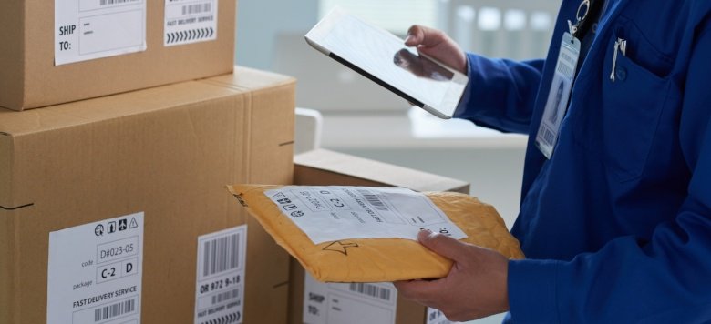 Holding a padded envelope